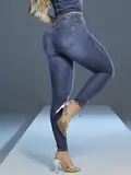 Calça Skinny Modeladora com Lavado Médio e Detalhes Únicos Pit Bull Jeans