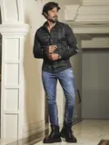 Calça Masculina Sofisticada com Lavado Médio e Detalhes Puídos Pit Bull Jeans