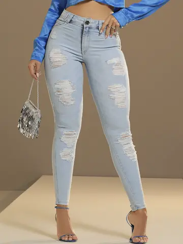 Calça Skinny Modeladora com Lavado Claro e Detalhes Navalhados Pit Bull Jeans