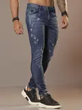 Calça Masculina Sofisticada com Lavado Médio e Detalhes Puídos Pit Bull Jeans