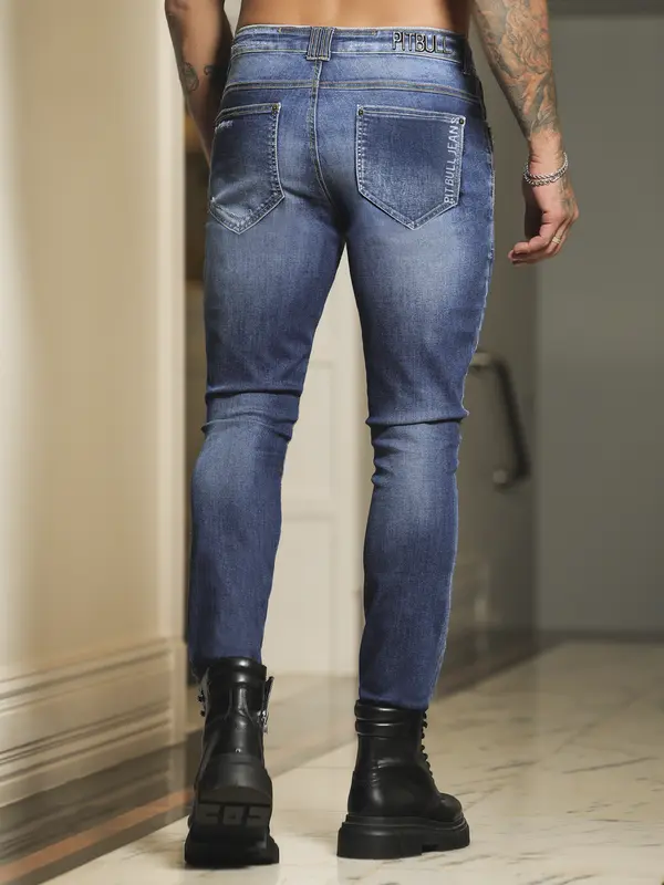 Calça Masculina Sofisticada com Lavado Médio e Detalhes Puídos Pit Bull Jeans Luxo