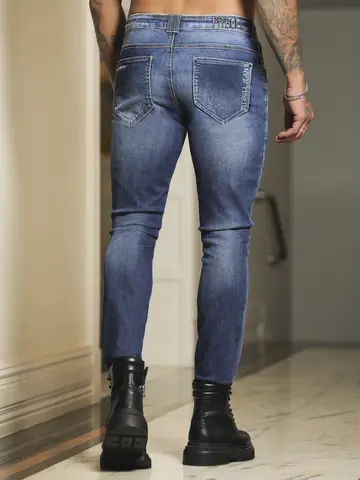 Calça Masculina Sofisticada com Lavado Médio e Detalhes Puídos Pit Bull Jeans Luxo